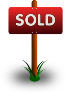 A Red Real Estate Sign Reading “Sold” | KeyRealtySchool.com